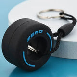 Luxury racing tire keychain featuring a detailed tire design and a sturdy keyring for car enthusiasts