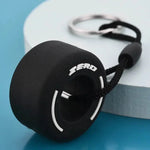 Luxury racing tire keychain made of durable rubber with a sleek design for car enthusiasts