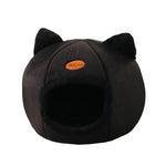 Cozy winter cat bed in black with cute cat ears and a soft, warm interior for comfortable napping