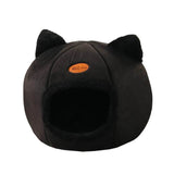 Cozy winter cat bed in black with cute cat ears and a soft, warm interior for comfortable napping