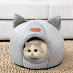 Cozy winter cat bed with plush material and playful ear design for indoor cats