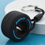 Luxury racing tire keychain featuring a detailed tire design and a sturdy keyring for car enthusiasts