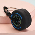 Luxury racing tire keychain made of rubber with colorful wheel detailing and a sturdy metal keyring