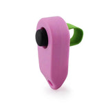Pink pet obedience clicker with a green strap for training pets effectively