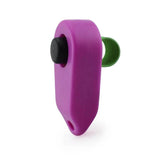 Purple pet obedience clicker with a black button and green wrist strap for training dogs