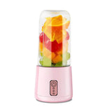 Portable Pink Blender with Clear Container for Mixing Fruits and Smoothies