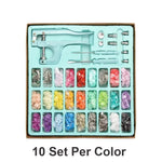 Complete snap pliers kit for cloth with various colored snaps and tools for crafting projects