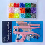 Snap pliers kit for cloth including colorful snaps and tools for DIY projects