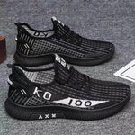 Stylish black casual shoes with breathable mesh upper and comfortable cushioning for everyday wear